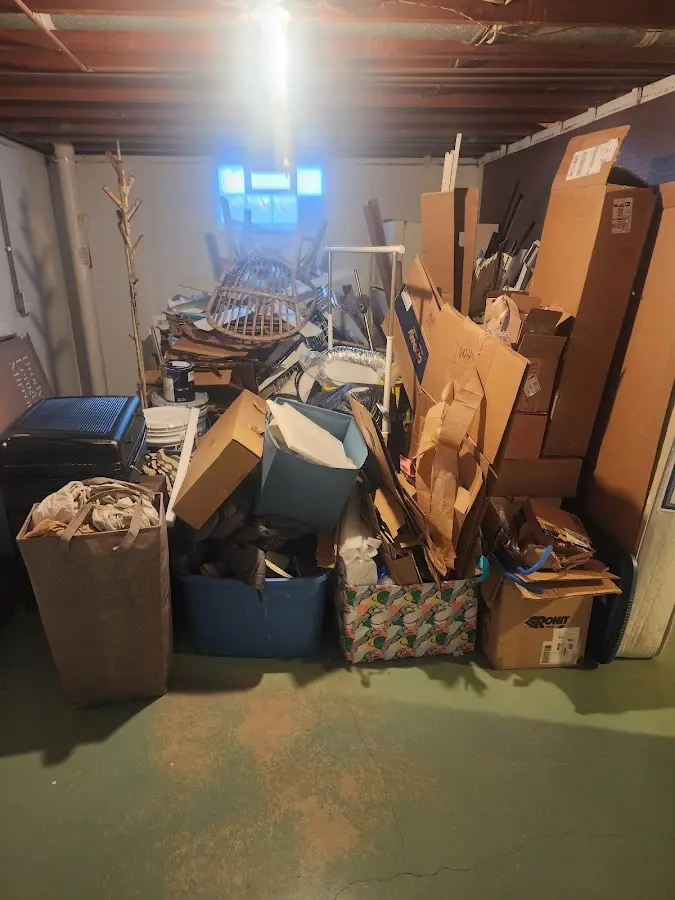 Roll-off dumpster container at job site for Construction Dumpster Rental in Newport